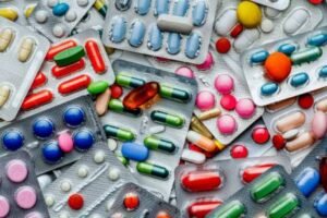 background-of-a-large-group-of-assorted-capsules-pills-and-blisters
